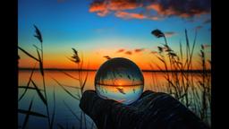 Creative crystal lens ball photography of a lake with greenery around at dawn[1920x1080]