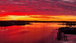 Fiery skies over calm waters (1920x1080)